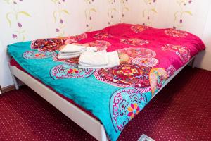 Ένα ή περισσότερα κρεβάτια σε δωμάτιο στο Center Walk Apartment and Room