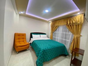 Ένα ή περισσότερα κρεβάτια σε δωμάτιο στο Hotel Dubai Suite