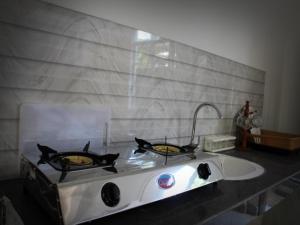 Η κουζίνα ή μικρή κουζίνα στο Singha Holidays +77 φωτογραφίες