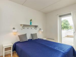 Postel nebo postele na pokoji v ubytování Holiday home Rudkøbing XIX