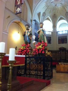 two statues of women on a altar in a church at Trullo Dell’Antica Fileria in Alberobello