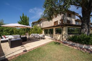 Vonkajšia záhrada v ubytovaní Villa L'Elsa