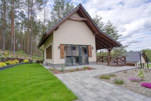 Vonkajšia záhrada v ubytovaní Wrzosowy Zakątek