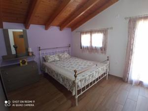 A bed or beds in a room at Traditional house in Akamatra square