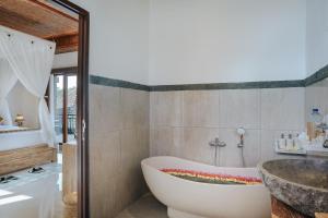 Ein Badezimmer in der Unterkunft Sitala Suite
