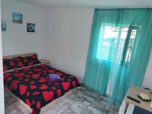 Postel nebo postele na pokoji v ubytování Casa Andrei A