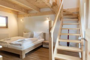 Łóżko lub łóżka w pokoju w obiekcie Ferienhaus Weitblick Altenbrak