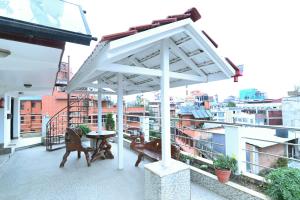 Balkón nebo terasa v ubytování Hotel M Square Pvt.Ltd