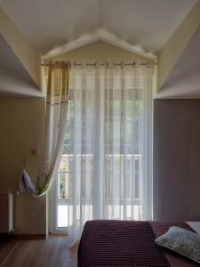 Postel nebo postele na pokoji v ubytování Apartments Serenity