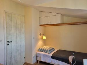 Postel nebo postele na pokoji v ubytování Apartments Serenity
