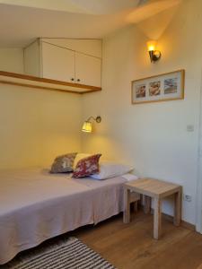 Postel nebo postele na pokoji v ubytování Apartments Serenity