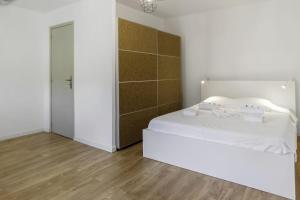 Posteľ alebo postele v izbe v ubytovaní Appartement Ventoux - Welkeys