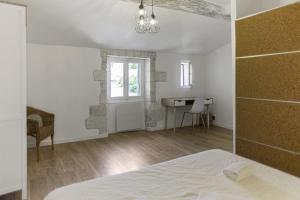 Posteľ alebo postele v izbe v ubytovaní Appartement Ventoux - Welkeys