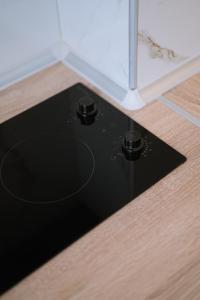 a black mat on the floor in a room at Summer Feelings in Skala Sotiros