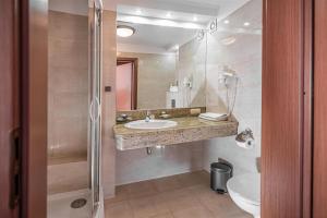 Koupelna v ubytování Hotel Rigga