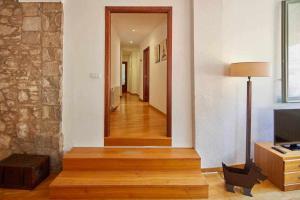 Televízia a/alebo spoločenská miestnosť v ubytovaní Apartamento Francesc Samsó Girona