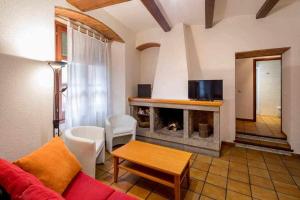 Televízia a/alebo spoločenská miestnosť v ubytovaní Apartamento Francesc Samsó Girona