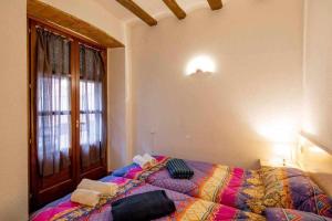 Posteľ alebo postele v izbe v ubytovaní Apartamento Francesc Samsó Girona