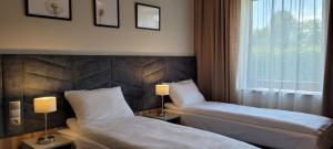 Villa & Gospoda Krakowska客房内的一张或多张床位