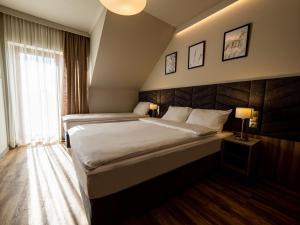 Villa & Gospoda Krakowska客房内的一张或多张床位