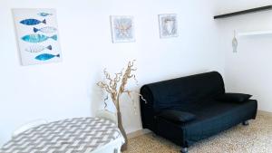 Posezení v ubytování Casa Gioia 2 - Le Ghiaie by ArgonautiVacanze