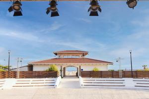 a building with a gate in front of it at Azul Beach Resort Montenegro by Karisma - All Inclusive in Ulcinj