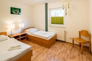 Postel nebo postele na pokoji v ubytování IDA Arendsee + 37 fotografií