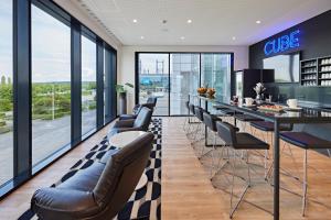 Posezení v ubytování LÉGÈRE HOTEL Erfurt + 37 fotografií
