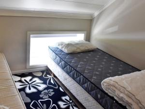 Ein Bett oder Betten in einem Zimmer der Unterkunft Holiday home Frei II