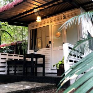 Φωτογραφία από το άλμπουμ του RUMAPOKO Guesthouse σε Pantai Cenang