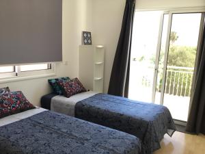 Ein Bett oder Betten in einem Zimmer der Unterkunft Villa Rossa