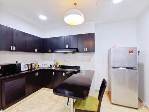 【Amazing】Pool View 2BR Suite @ Pulai Springs Resort的厨房或小厨房