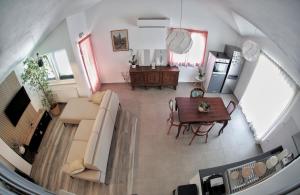 TV a/nebo společenská místnost v ubytování Apartment Tugare + 13 fotografií