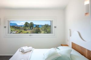 Postel nebo postele na pokoji v ubytování Sardegna è - Villa Relax&Design