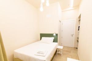 A bed or beds in a room at Migliori Olive Ascolane beds
