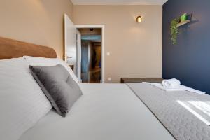 Cama ou camas em um quarto em Hotel Sky