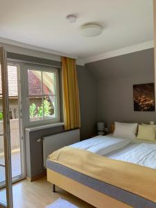 Postel nebo postele na pokoji v ubytování Villa Florl