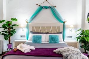 My Granada Garden - Mimosa studio tesisinde bir odada yatak veya yataklar
