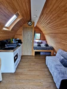 A kitchen or kitchenette at Glamping Pods Nr Port Isaac