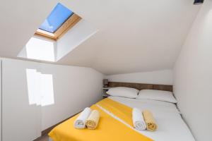 Postel nebo postele na pokoji v ubytování Central Apartments Dalmatina
