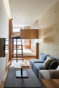 Postel nebo postele na pokoji v ubytování MUJI HOTEL GINZA