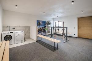 Posilňovňa alebo fitness centrum v ubytovaní Kuenz Dolomites App 5