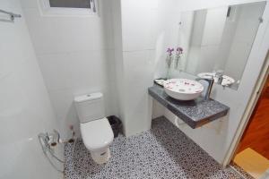 Koupelna v ubytování Royal Pearl Hotel