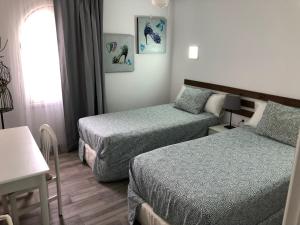 Postel nebo postele na pokoji v ubytování Apartamento con piscina y vistas -Le Petit Paradis