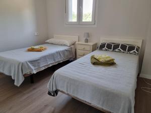 En eller flere senge i et værelse på Estepona Centro Wellingtonia + 3 billeder