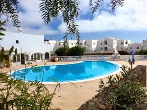 Zdjęcie z galerii obiektu Apartamento con piscina y vistas -Le Petit Paradis w Costa Teguise