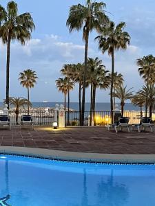 The swimming pool at or close to marina real 221