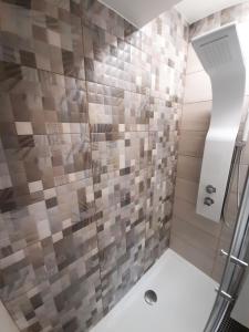A bathroom at Beautiful appartment front of see, wifi free