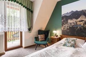 Posteľ alebo postele v izbe v ubytovaní Willa Kocham Tatry