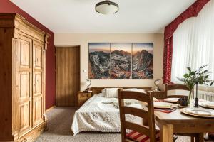 Posteľ alebo postele v izbe v ubytovaní Willa Kocham Tatry